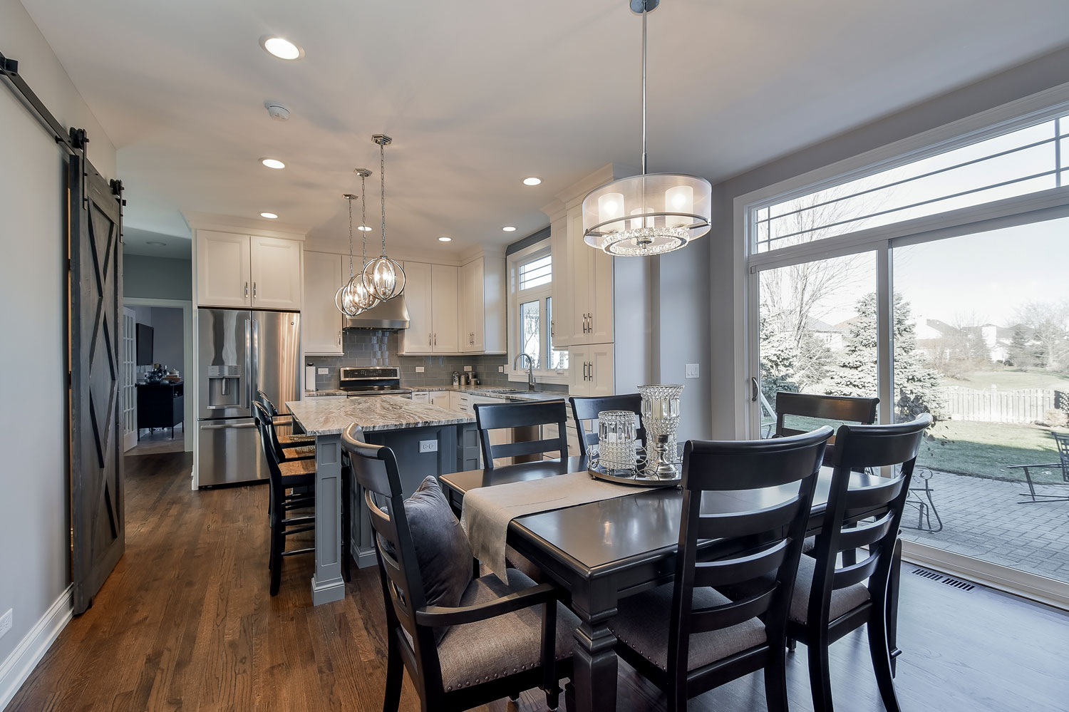 Kitchen-Barndoor-Open-Floorplan-Grey-Island-White-Quartz